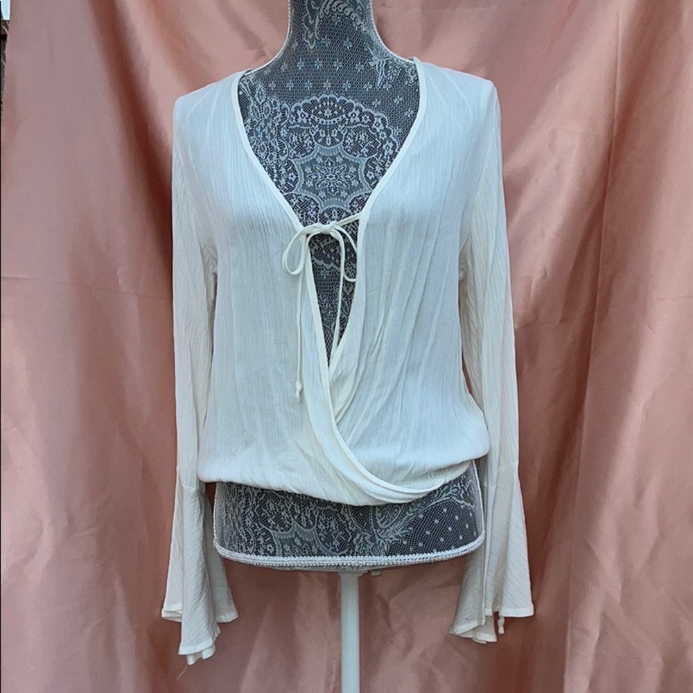 Women’s white open front blouse